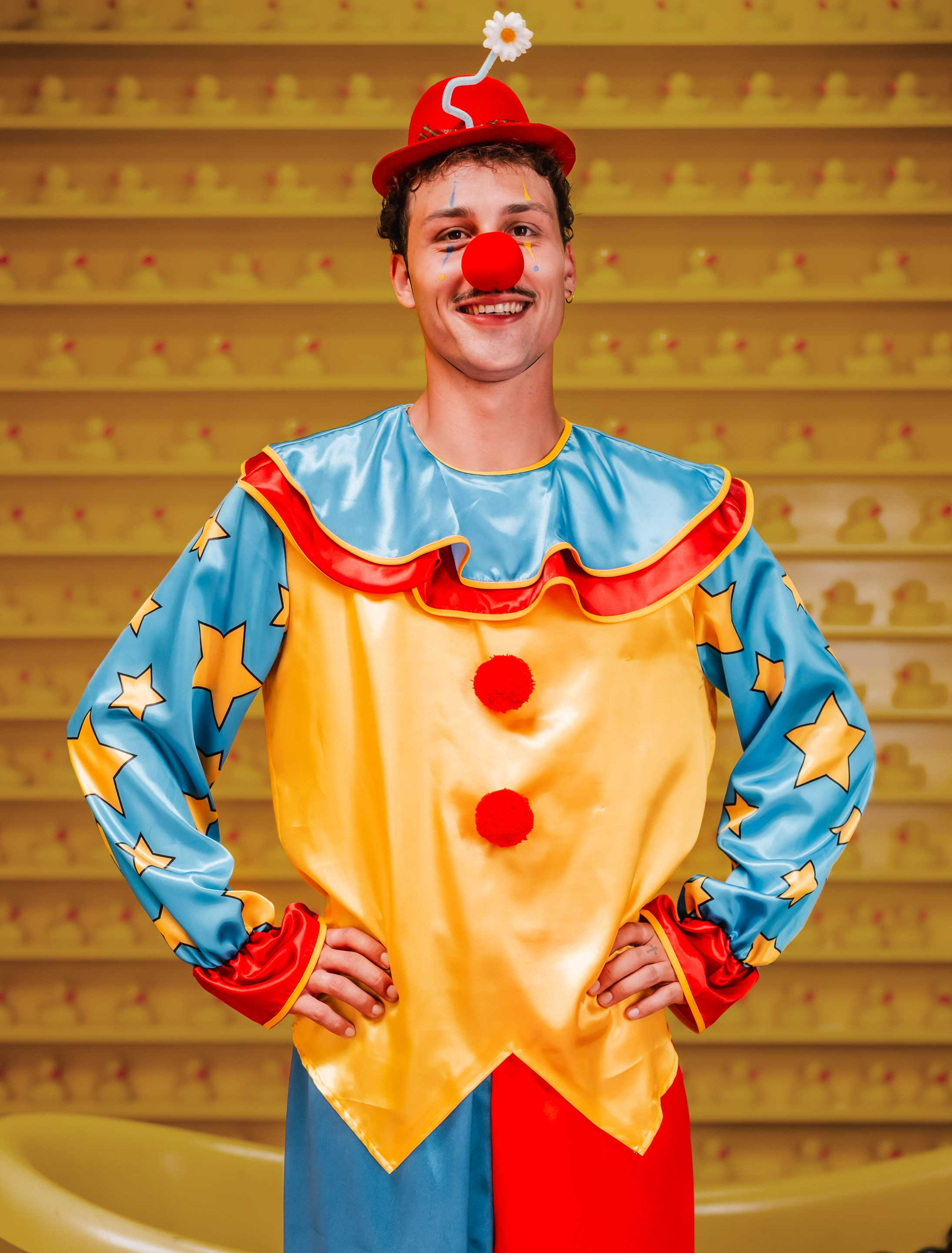 Oberteil Clown mit Pompoms und Sternen bunt L/XL