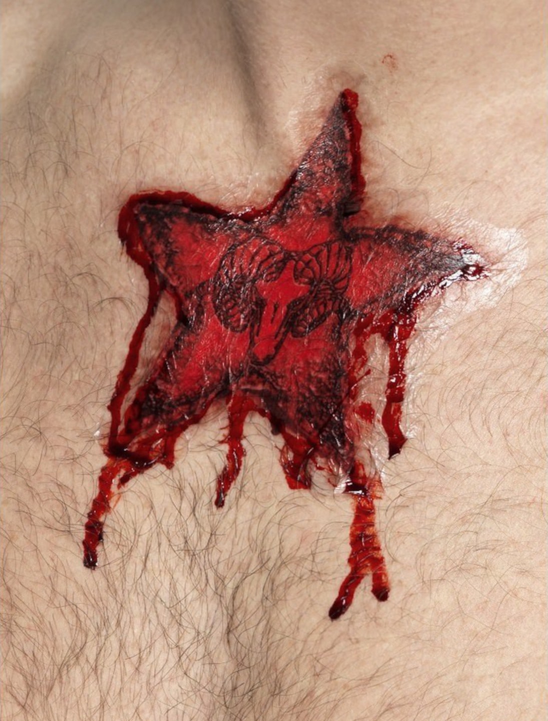 Tattoo Stern blutig mit Widderkopf